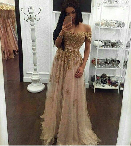 Gold off best sale shoulder prom dress